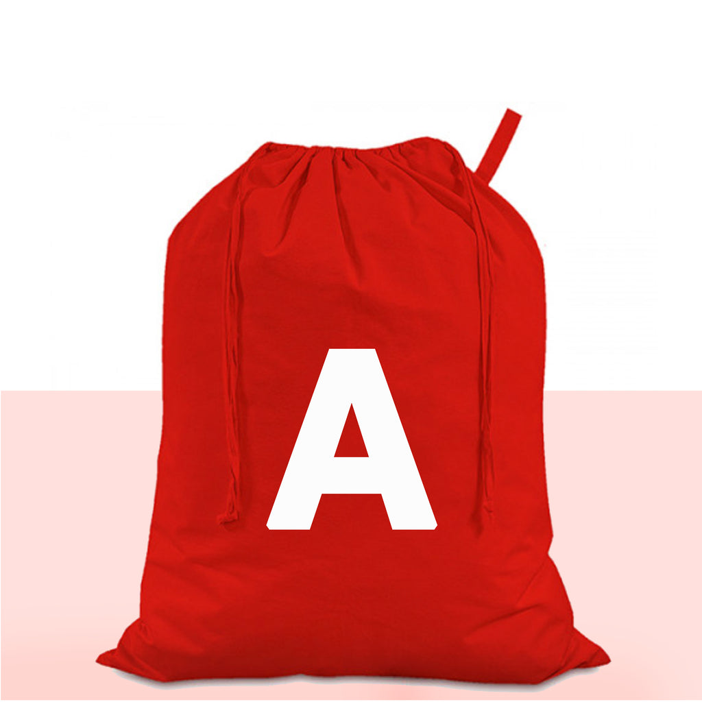 Red drawstring bag with a white letter 'A' on a light pink background