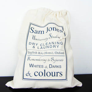 White drawstring bag with blue text on a white background