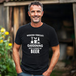 Man wearing a black t-shirt with gardening and beer text in a garden setting